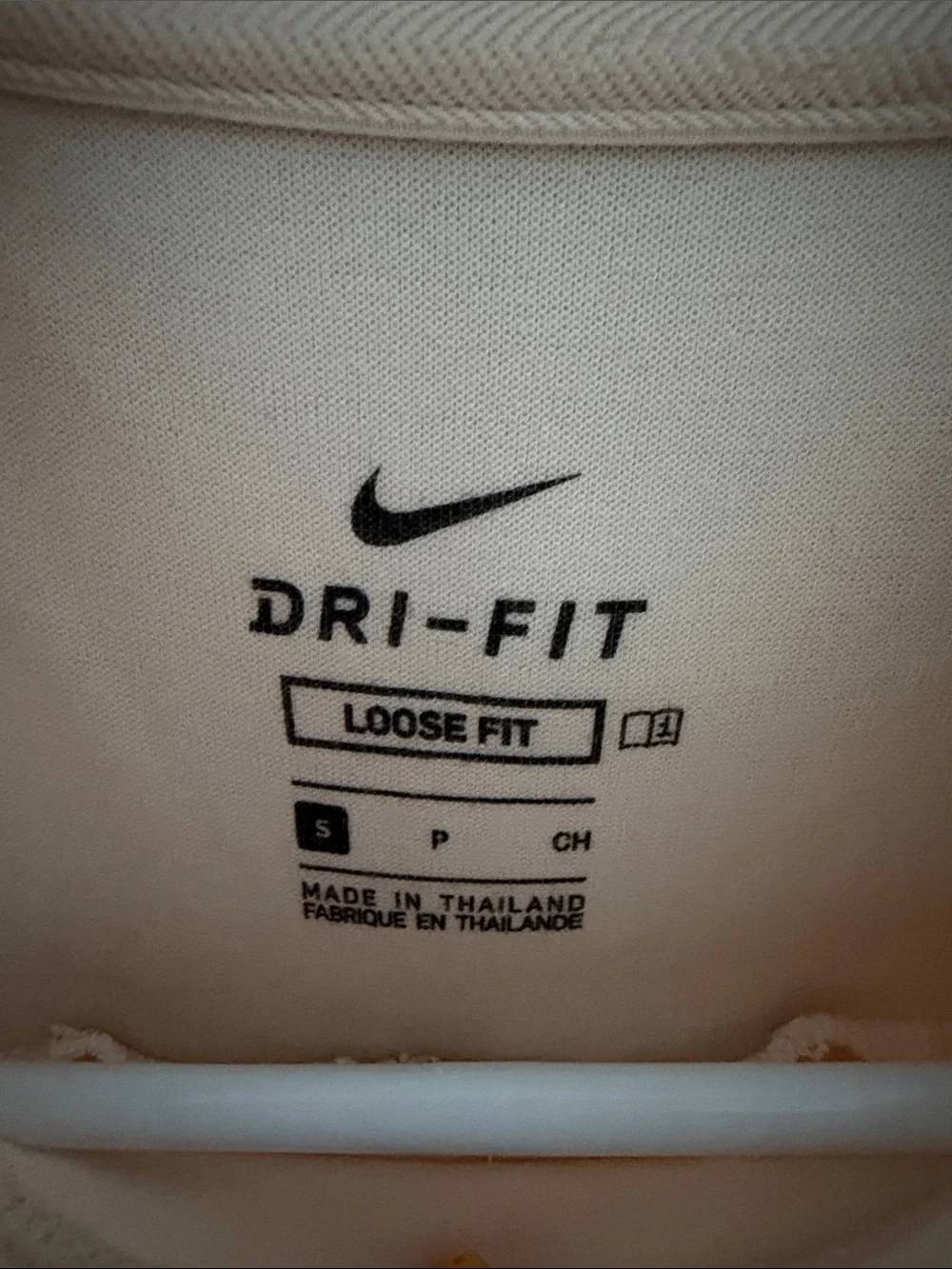 Nike Dri-FIT Loose Fit Top in Pale Pink